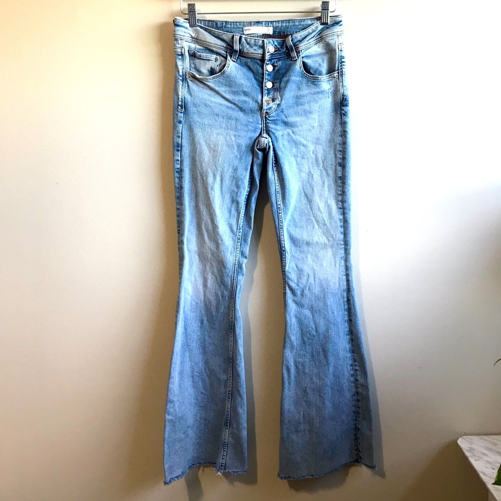 Zara flare light washed denim jeans with expised button fly size 4